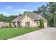 Attractive brick home with manicured lawn and professional landscaping at 1560 Tapestry Rdg, Lawrenceville, GA 30045