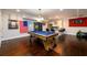 Large game room with a pool table and a bar area, great for entertaining and relaxing at 1560 Tapestry Rdg, Lawrenceville, GA 30045