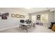 Office with bright windows, carpeted floors, and space for work at 1560 Tapestry Rdg, Lawrenceville, GA 30045