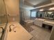 Bright bathroom featuring a soaking tub, walk-in shower, and double sink vanity at 1074 Bradshaw Estates Dr, Canton, GA 30115
