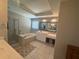 Bright bathroom featuring a soaking tub, walk-in shower, and double sink vanity at 1074 Bradshaw Estates Dr, Canton, GA 30115