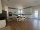Spacious kitchen with a center island, stainless appliances, and lots of natural light at 1074 Bradshaw Estates Dr, Canton, GA 30115