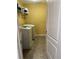 Neat laundry room featuring shelving and modern washing machines at 1074 Bradshaw Estates Dr, Canton, GA 30115