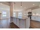 Kitchen island with granite countertop and pendant lighting at 1414 Alcovy Station Rd, Covington, GA 30014