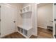 Convenient laundry room with built-in storage and utility sink at 1414 Alcovy Station Rd, Covington, GA 30014