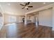 Large living room with hardwood floors, high ceilings, and ceiling fan at 1414 Alcovy Station Rd, Covington, GA 30014