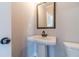 Bathroom with pedestal sink and updated fixtures at 1422 Alcovy Station Rd, Covington, GA 30014