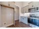Kitchen with built-in stainless steel appliances at 1422 Alcovy Station Rd, Covington, GA 30014