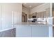 Open kitchen with island and granite countertops at 1422 Alcovy Station Rd, Covington, GA 30014