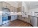 Well-equipped kitchen featuring stainless steel appliances and granite countertops at 1422 Alcovy Station Rd, Covington, GA 30014