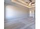 Bright and airy main bedroom featuring a trey ceiling and recessed lighting at 1422 Alcovy Station Rd, Covington, GA 30014