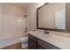 Well-lit bathroom equipped with a tub-shower combination and a stylish vanity at 1452 Alcovy Station Rd, Covington, GA 30014