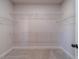 Spacious walk-in closet with adjustable shelving, maximizing storage and organization at 1452 Alcovy Station Rd, Covington, GA 30014