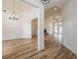 Bright dining room with hardwood floors and chandelier at 1452 Alcovy Station Rd, Covington, GA 30014