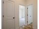 Hallway with doors to bedrooms and other rooms at 1452 Alcovy Station Rd, Covington, GA 30014