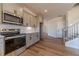 Kitchen featuring stainless steel appliances and gray cabinets at 1452 Alcovy Station Rd, Covington, GA 30014