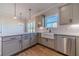Kitchen island with granite countertop and stainless steel appliances at 1452 Alcovy Station Rd, Covington, GA 30014