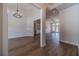 Elegant living room with beautiful floors and modern chandelier at 1452 Alcovy Station Rd, Covington, GA 30014