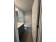 Modern bathroom with gray vanity, and shower-tub combination, providing a clean and functional space at 5000 Fairview Cir, Villa Rica, GA 30180