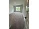 Bedroom featuring carpet floors and a window letting in ample natural light at 5000 Fairview Cir, Villa Rica, GA 30180