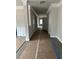 Well-lit hallway featuring crown molding and neutral paint, showcasing the home's attention to detail at 5000 Fairview Cir, Villa Rica, GA 30180