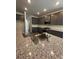 Spacious kitchen featuring granite countertops, gray cabinets, and stainless steel appliances at 5000 Fairview Cir, Villa Rica, GA 30180