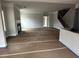 Expansive living room features a fireplace and stairway to the second floor at 5000 Fairview Cir, Villa Rica, GA 30180