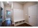 Mudroom with dark wood floors and built-in bench with storage at 37 Harmony Ridge Dr, Temple, GA 30179