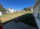 Fenced backyard with patio and open grassy area at 6090 Kingston Ln, Mcdonough, GA 30253