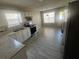 Modern kitchen with stainless steel appliances and tile floor at 6090 Kingston Ln, Mcdonough, GA 30253