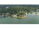 Luxury lakefront homes with private docks and lush landscaping at 7042 Confederate Ct, Villa Rica, GA 30116