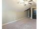 Large bedroom with sloped ceilings, carpet, and ceiling fan at 7042 Confederate Ct, Villa Rica, GA 30116