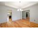 Bright dining room with hardwood floors and a chandelier at 7042 Confederate Ct, Villa Rica, GA 30116