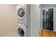 Convenient laundry room with stackable washer and dryer at 7042 Confederate Ct, Villa Rica, GA 30116