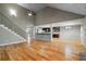 Living room with hardwood floors, high ceilings, and an open floor plan at 7042 Confederate Ct, Villa Rica, GA 30116