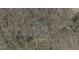 Aerial view shows lot surrounded by trees at 413 Solace Pl, Canton, GA 30114