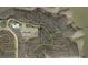 Aerial view of lot showing neighborhood roads, nearby houses and access to a pond at 413 Solace Pl, Canton, GA 30114