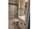 Clean bathroom with a shower-tub combo and modern vanity at 413 Solace Pl, Canton, GA 30114