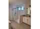 Modern bathroom featuring a walk-in glass shower, tile surround, and granite countertops at 413 Solace Pl, Canton, GA 30114