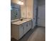 Clean bathroom featuring tile flooring, a tile surround shower, and granite countertops at 413 Solace Pl, Canton, GA 30114