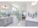 Modern bathroom featuring double sinks, a walk-in glass shower, and neutral tones throughout at 413 Solace Pl, Canton, GA 30114