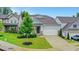 Inviting single-Gathering home with a well-kept lawn, professional landscaping, and a two-car garage at 413 Solace Pl, Canton, GA 30114