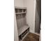 Hall tree with cubbies, hooks, bench seating, and shoe storage, perfect for an organized mudroom area at 413 Solace Pl, Canton, GA 30114