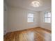 Bright bedroom with hardwood floors and two windows at 1098 Jefferson Ave, Atlanta, GA 30344