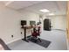 Basement office with desk and two monitors at 5322 Seaton Dr, Dunwoody, GA 30338