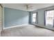 Bright bedroom with light blue walls and carpet at 5322 Seaton Dr, Dunwoody, GA 30338