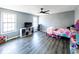 Bright bedroom with wood-look floors and plenty of space for furniture at 5479 Dorsett Shoals Rd, Douglasville, GA 30135