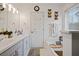 Double vanity bathroom with a soaking tub and shower at 1809 Francon Sw Ct, Conyers, GA 30094