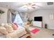Bright bedroom featuring a comfy bed and flat-screen TV at 2354 Attewood Dr, Buford, GA 30519