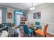 Bright dining room features hardwood floors and a charming table setting at 2354 Attewood Dr, Buford, GA 30519
